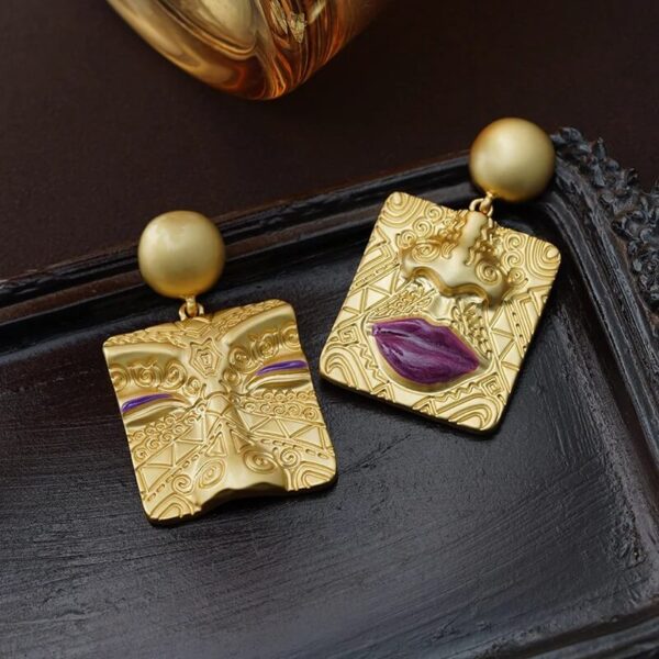 Asymmetric Embossed Gold Portrait Earrings