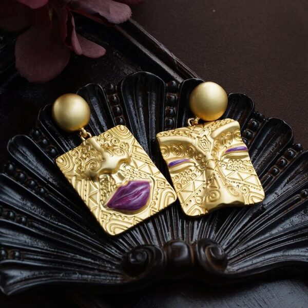 Asymmetric Embossed Golden Portrait Earrings (1)