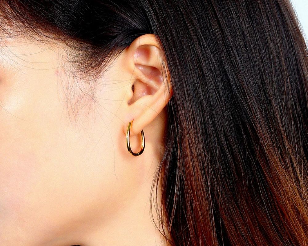wearing earrings 24-7